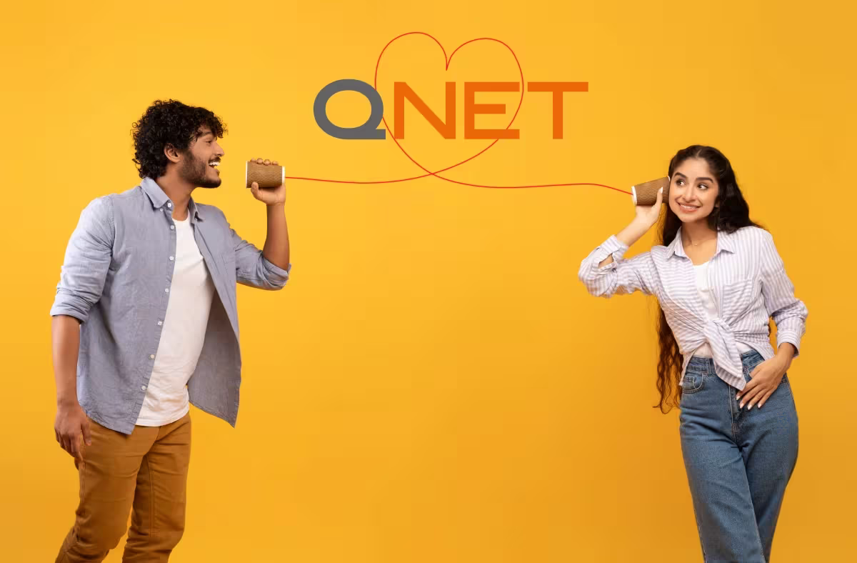 Youth direct selling industry entrepreneurs talking to each other with QNET is in a heart in the middle