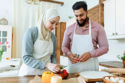 Man and woman preparing food for Ramadan
