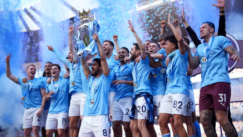 Winning Moments From Our Qnet-Man City Partnership 6 QNET-ManCity Celebrating with their 2023 English Premier League trophy