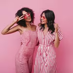 Lessons from Barbie - Two girls in pink having a good time