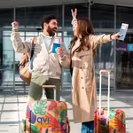 Couple excited to escape winter season by going on a budget-friendly package holiday, which they booked through a QVI holiday membership product called QVI Vacay
