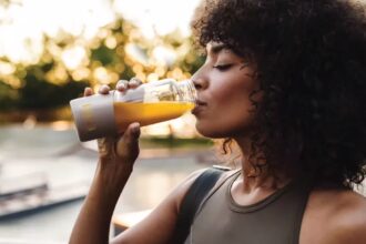 Woman drinking EDG3 Plus which provides the amino acids needed to produce glutathione for immunity