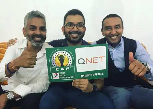 V Partners Sathi Senathirajah, "Chief" Pathman Senathirajah, and Adly Hassan celebrate the QNET-CAF partnership announcement in 2018