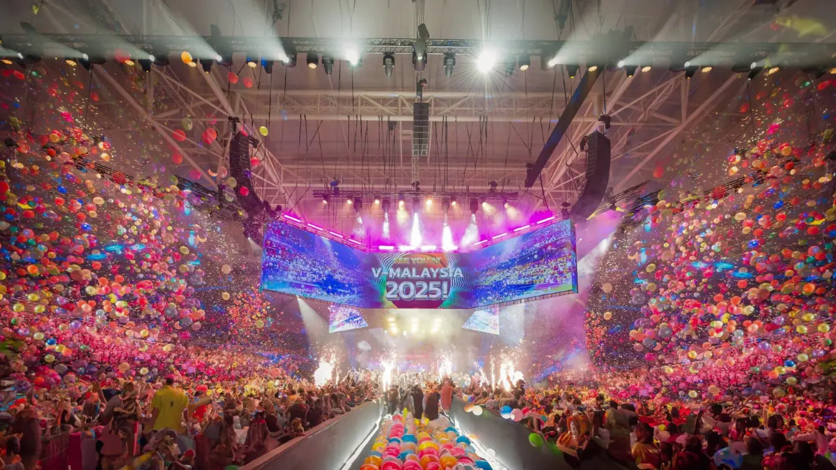 Photo announcing V-Malaysia 2025, one of the prizes for Remember Your Why QNET Contest