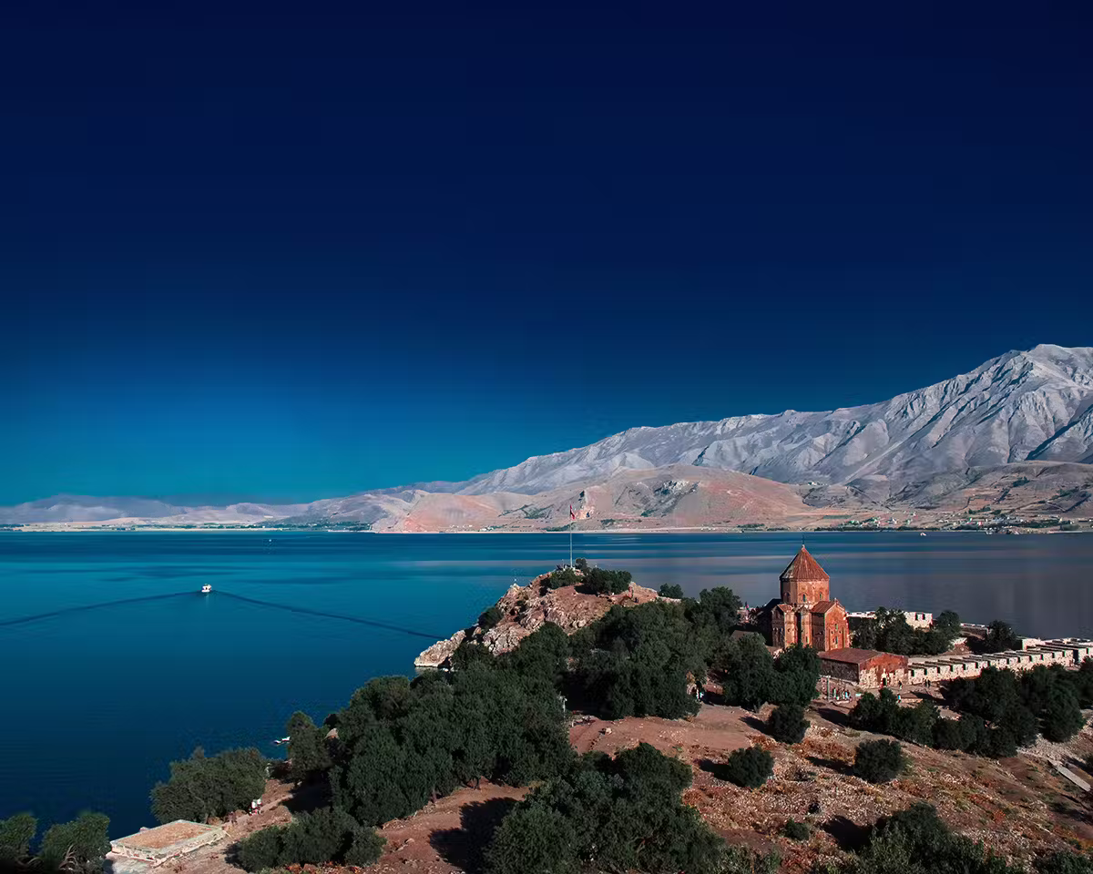 A monastery on Akdamar Island in one of the best lakes to visit around the world, Lake Van, Turkiye.